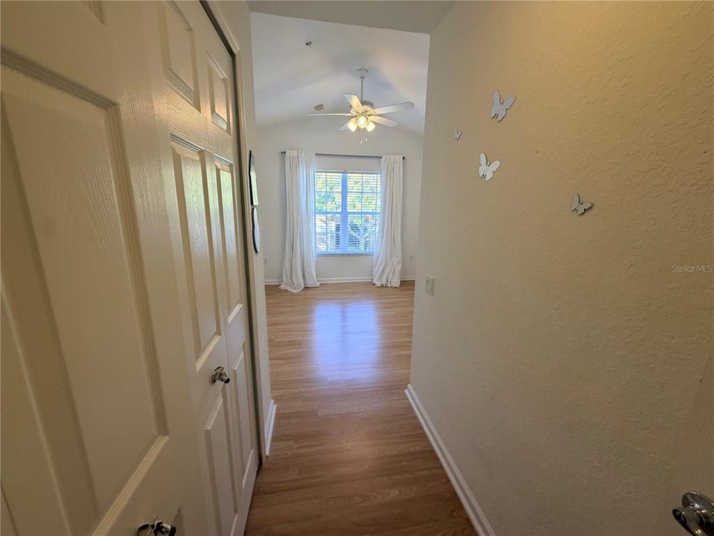 2837 Villafuerte Point, Unit 105 Orlando, FL 32835 - Photo 19 of 23 a view of gallery with wooden floor