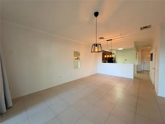 a view of a big room with windows