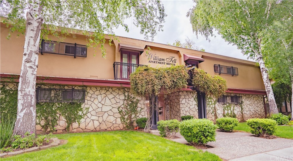 front view of a house with a small yard