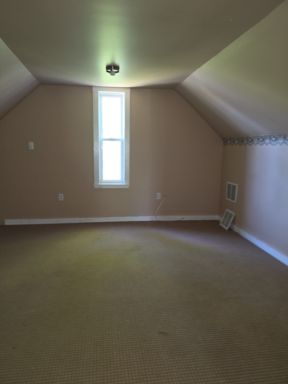 44-th 19th Street, Unit REAR Lowell, MA 01850 - Photo 4 of 13 an empty room with a window