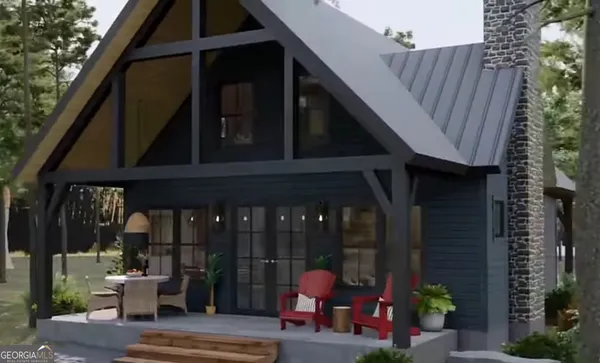 a view of a patio with table and chairs and potted plants