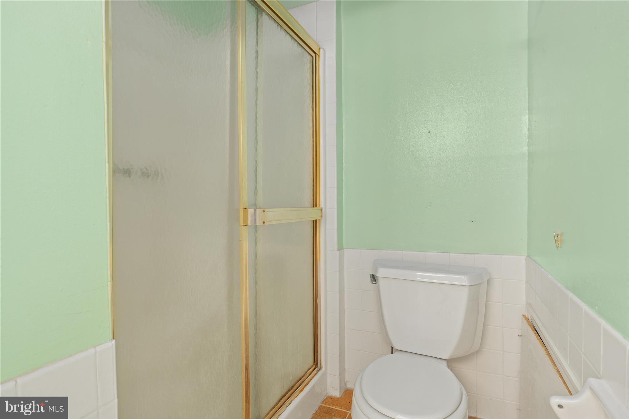 263 Bowling Green Road Front Royal, VA 22630 - Photo 34 of 75 a white toilet sitting next to a shower