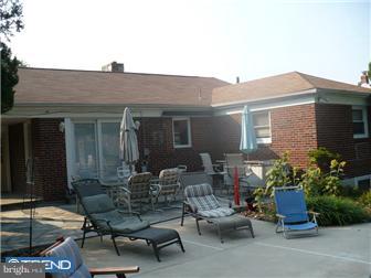 1437 Shoemaker Road Abington, PA 19001 - Photo 10 of 12 a backyard of a house with outdoor seating
