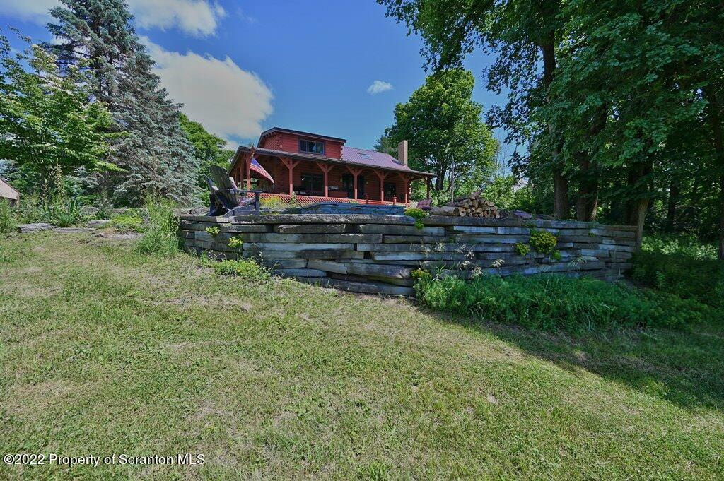 745 Woodbourne Road Montrose, PA 18801 - Photo 71 of 120 a front view of a house with a yard