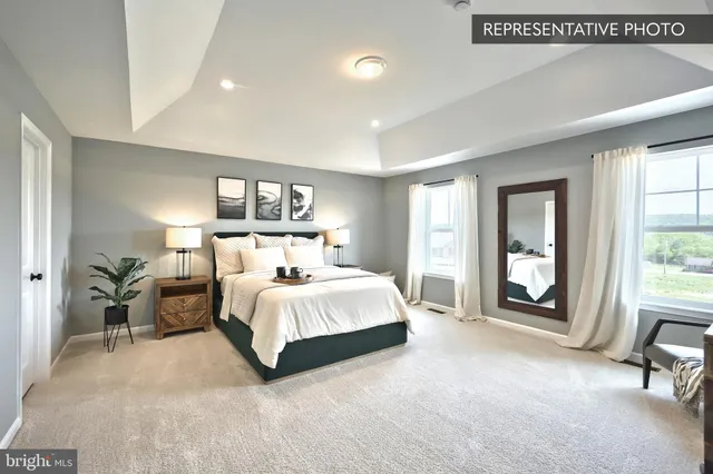 a bed room with a bed and a large mirror