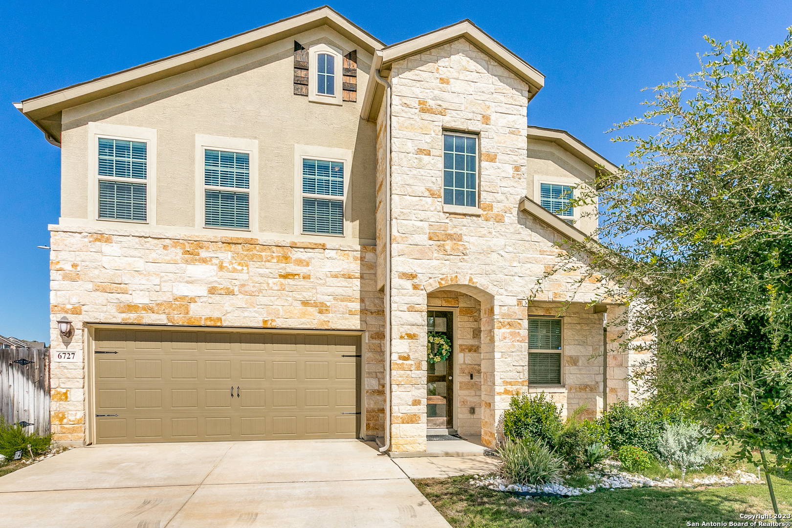 6727 Chesai Ranch San Antonio, TX 78249 - Photo 1 of 1 a front view of a house with a yard