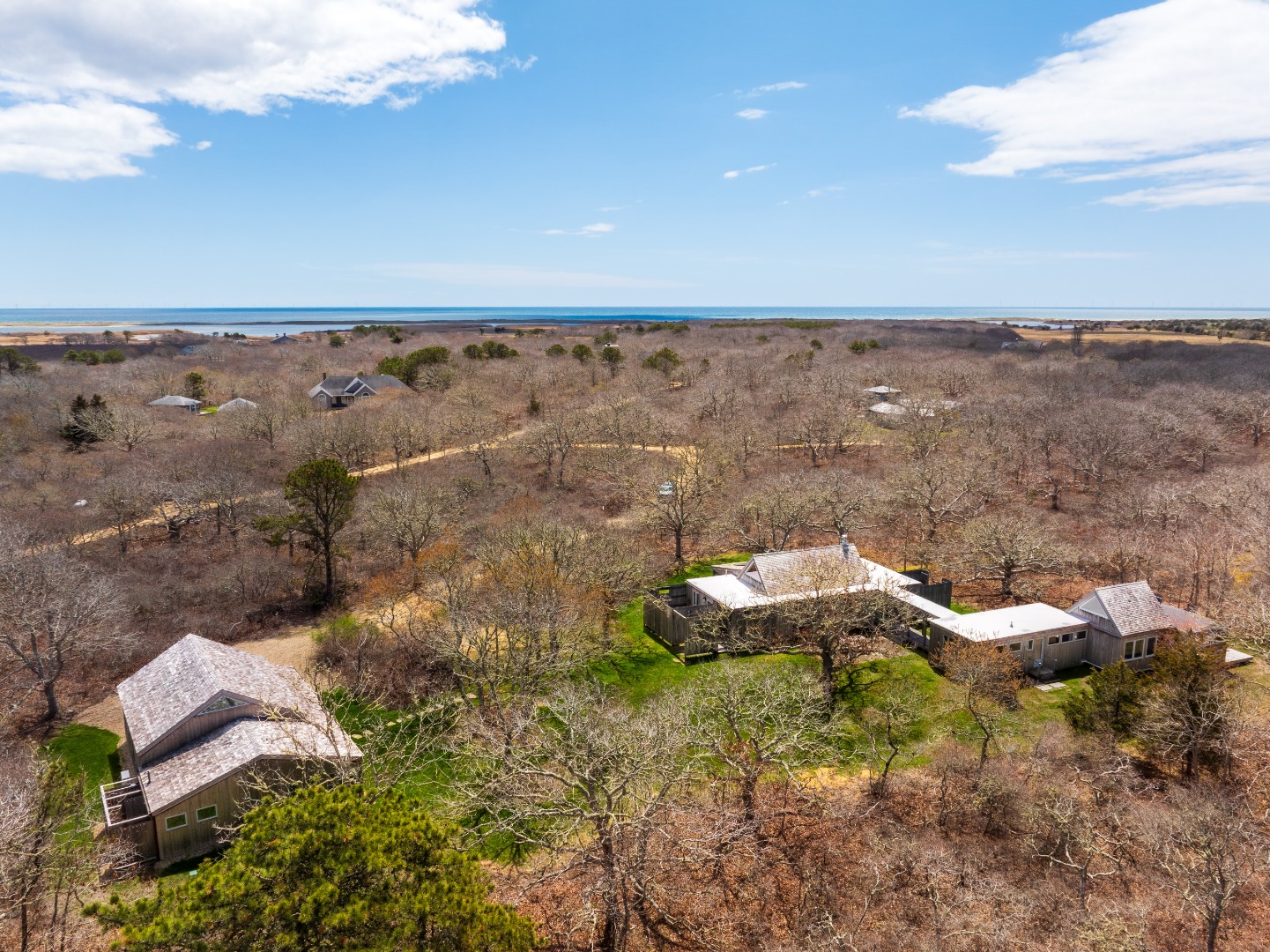 an aerial view of a house with a garden