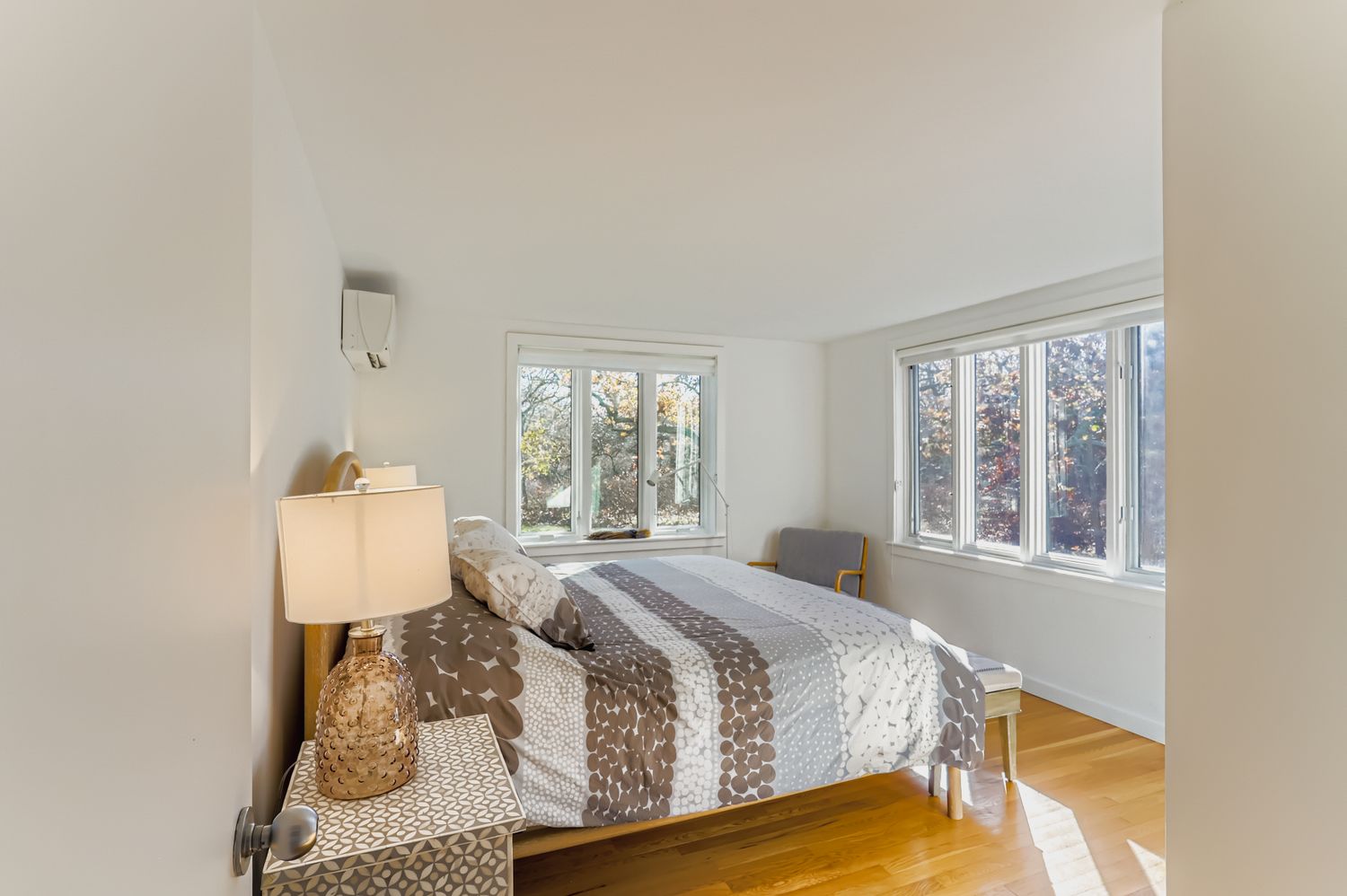 7 Black Point Road Chilmark, MA 02535 - Photo 12 of 47 a bed sitting in a bedroom next to a window