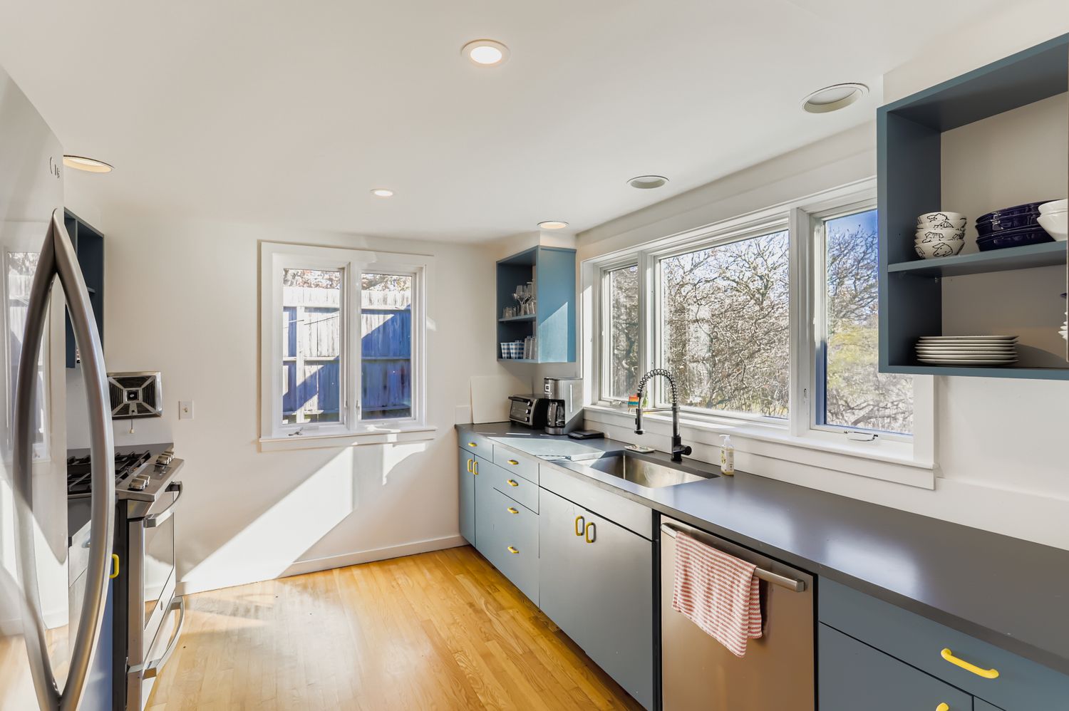 7 Black Point Road Chilmark, MA 02535 - Photo 22 of 47 a kitchen with a sink stainless steel appliances and windows