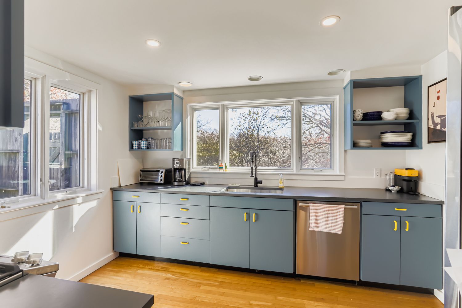 7 Black Point Road Chilmark, MA 02535 - Photo 24 of 47 a kitchen with a sink and wooden cabinets