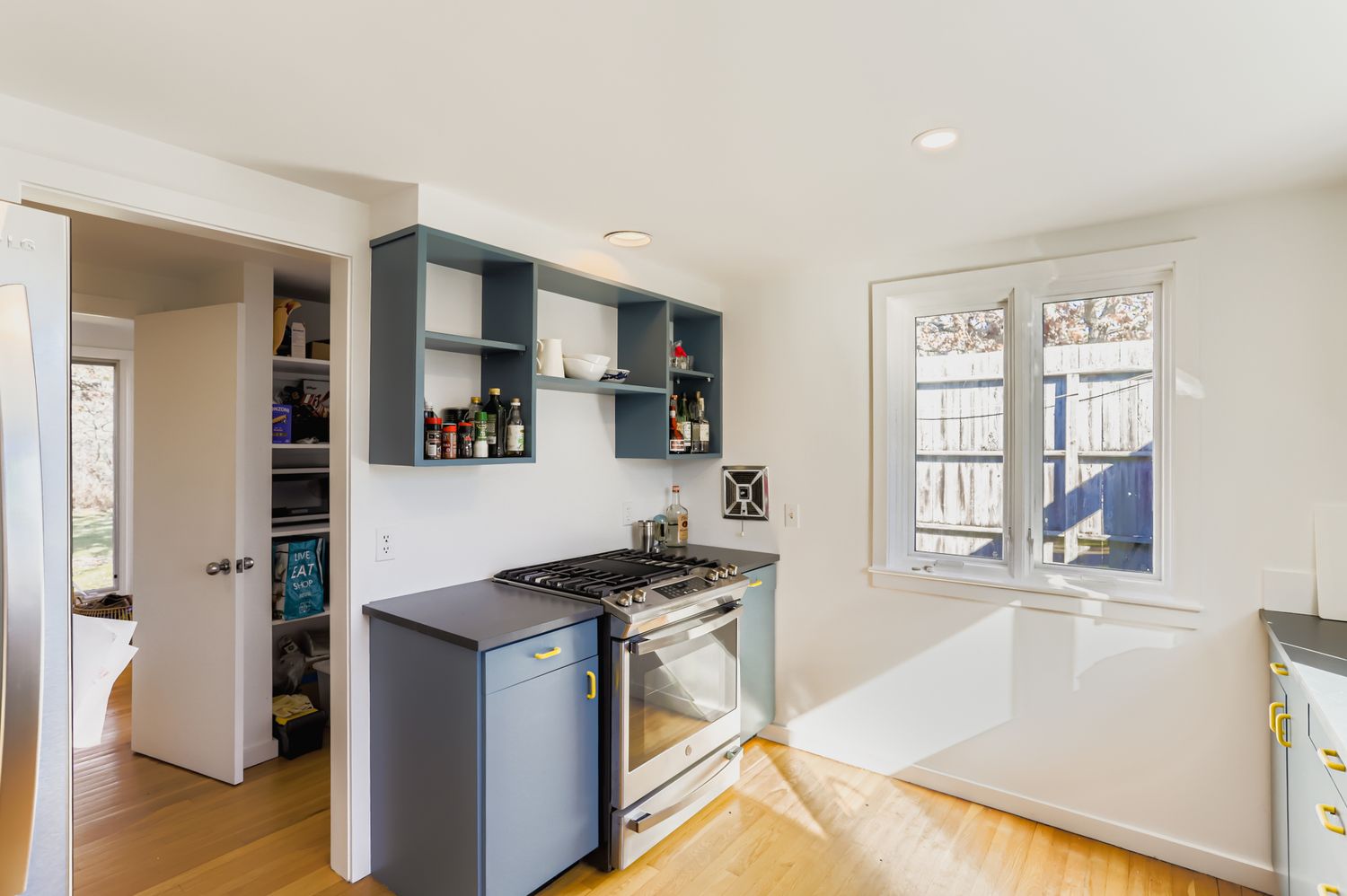 7 Black Point Road Chilmark, MA 02535 - Photo 25 of 47 a kitchen with stainless steel appliances granite countertop a stove and a refrigerator