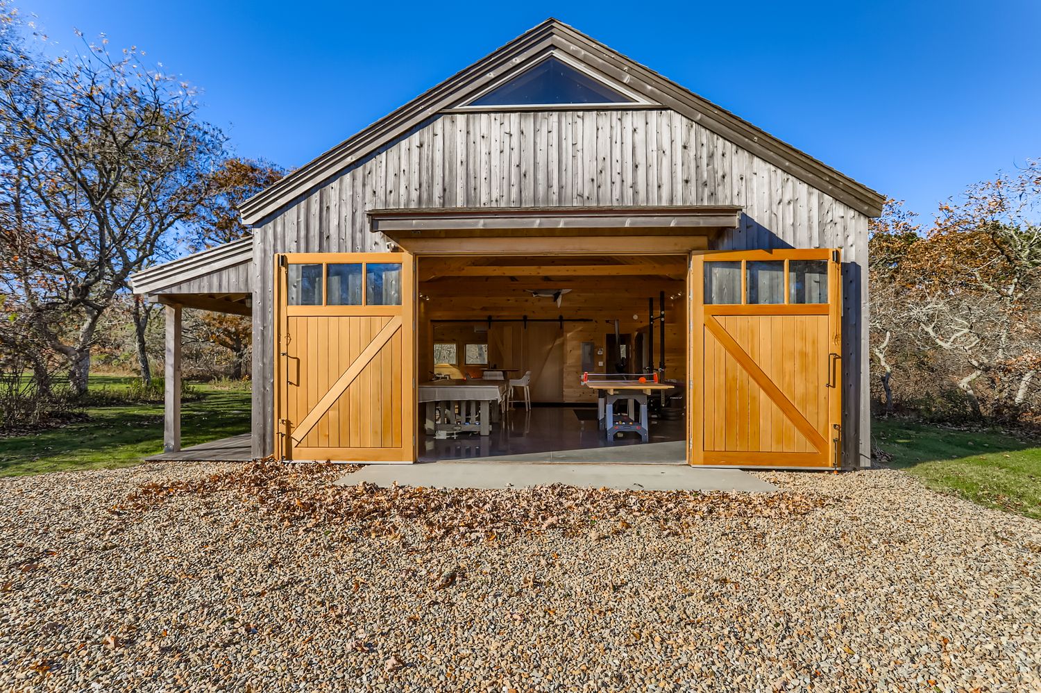 7 Black Point Road Chilmark, MA 02535 - Photo 34 of 47 a front view of a house with garden