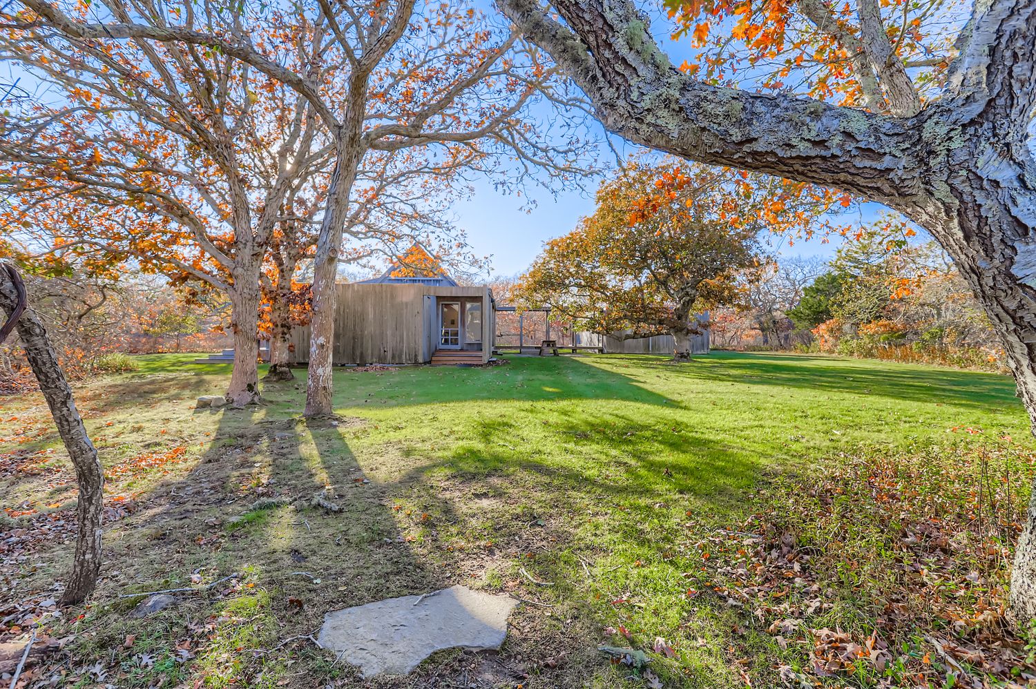 7 Black Point Road Chilmark, MA 02535 - Photo 45 of 47 a backyard of a house with lots of green space