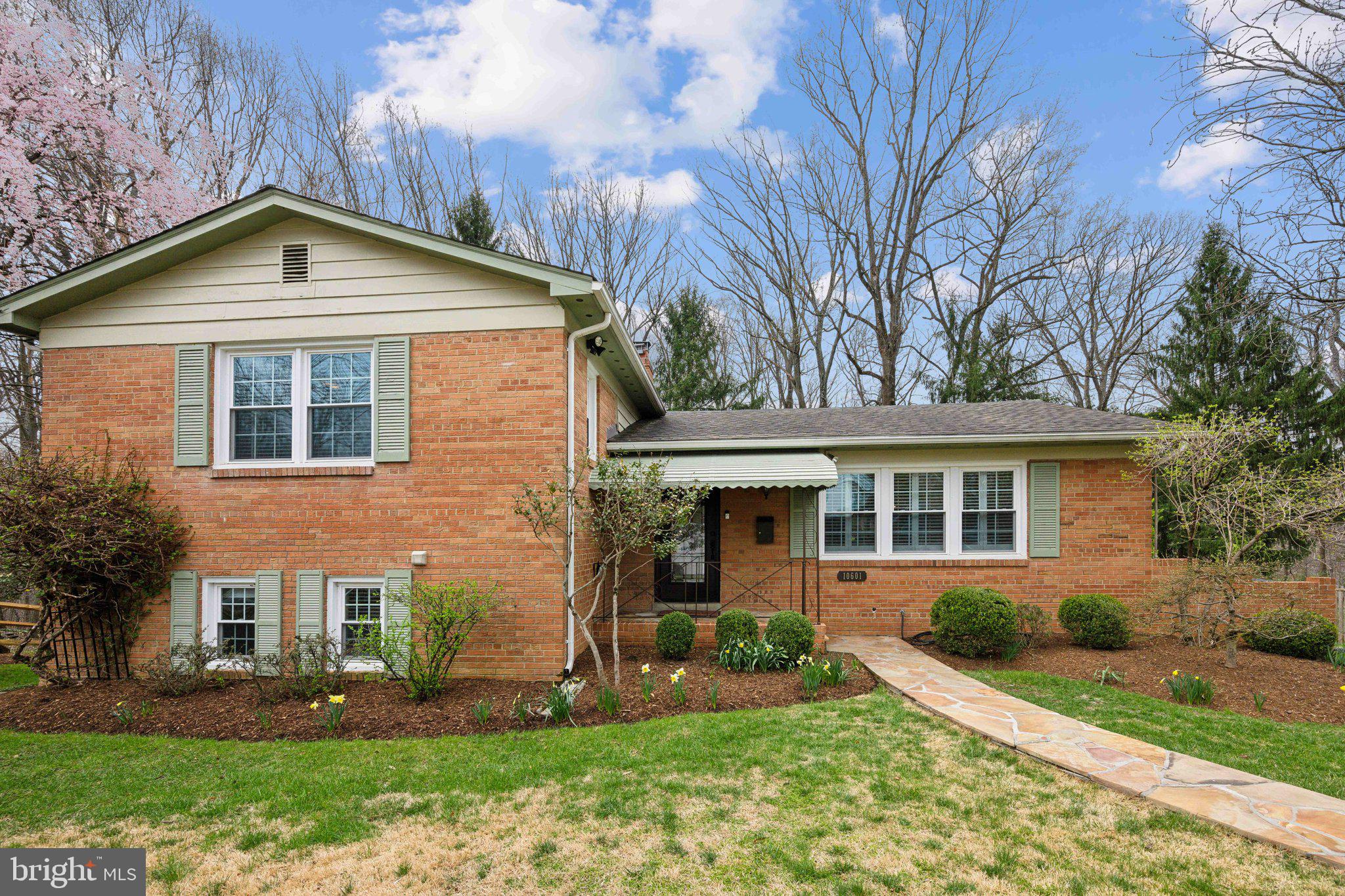 front view of house with a yard