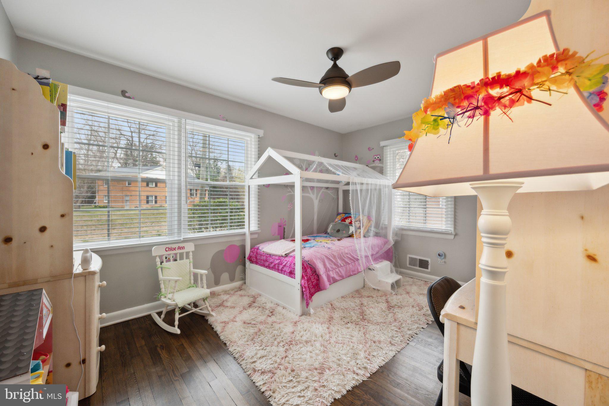 10601 Meadowhill Road Silver Spring, MD 20901 - Photo 16 of 33 a bedroom with a bed and a window