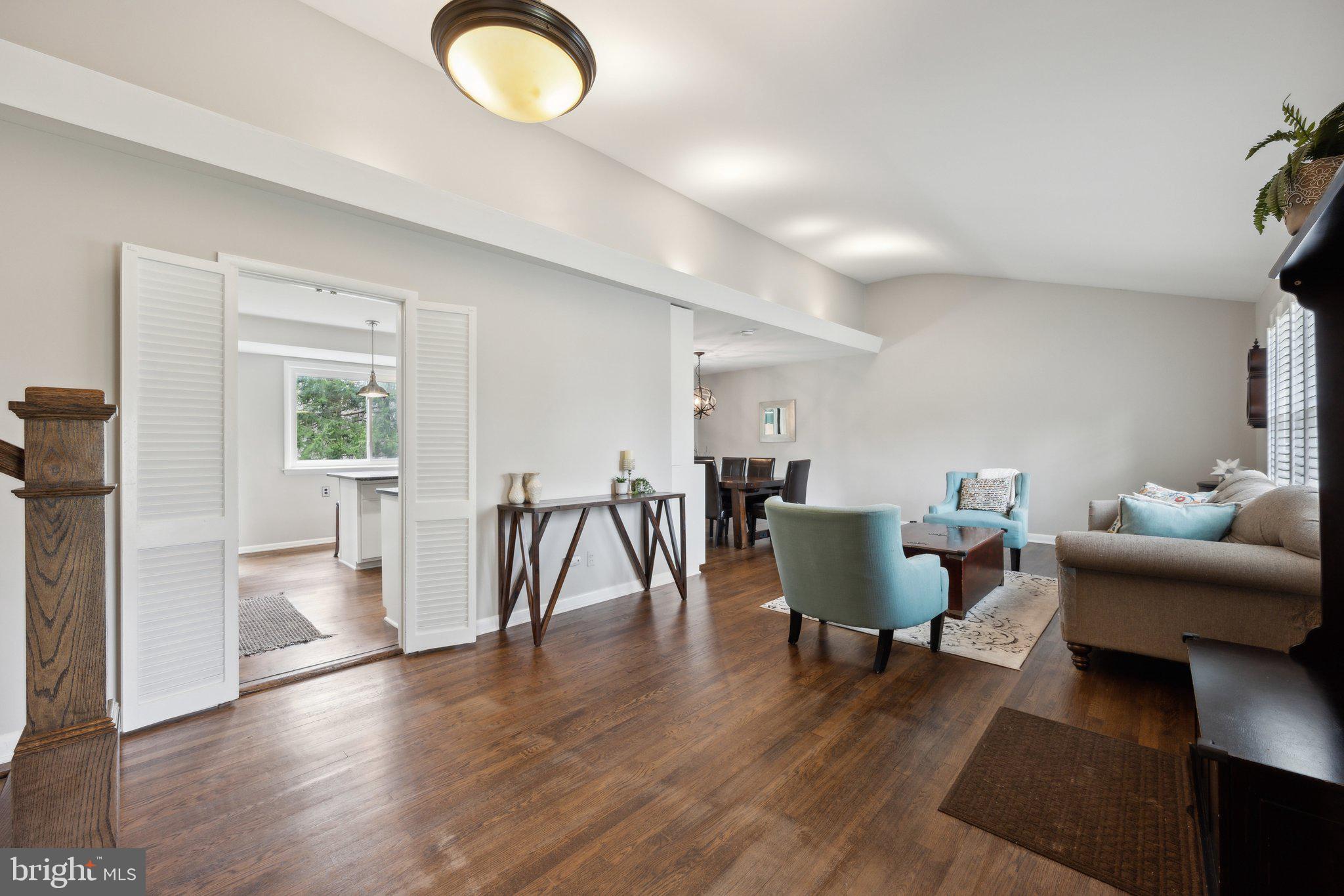 10601 Meadowhill Road Silver Spring, MD 20901 - Photo 2 of 33 a living room with furniture and a wooden floor
