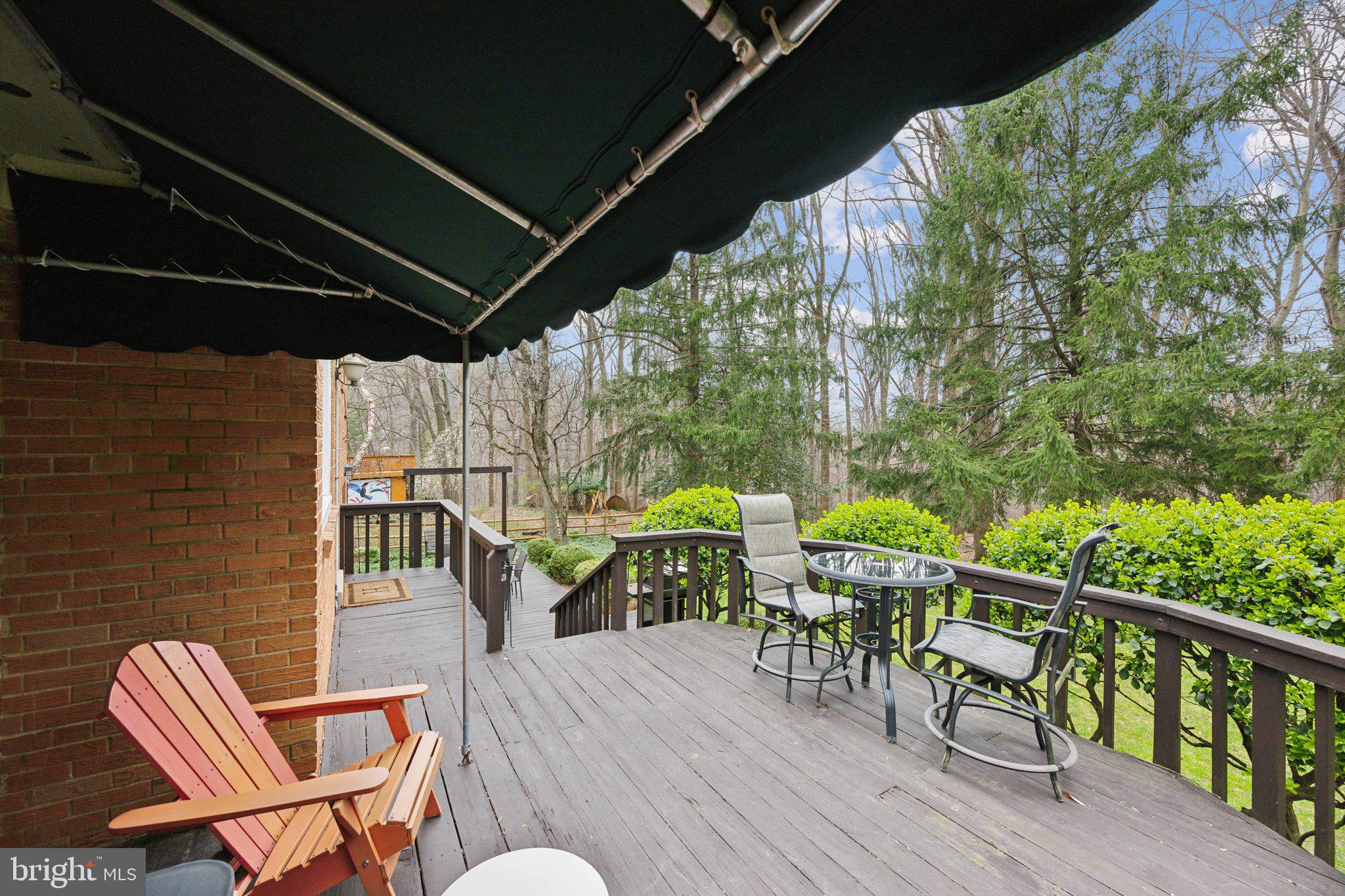 10601 Meadowhill Road Silver Spring, MD 20901 - Photo 29 of 33 a view of a chairs and table in the balcony
