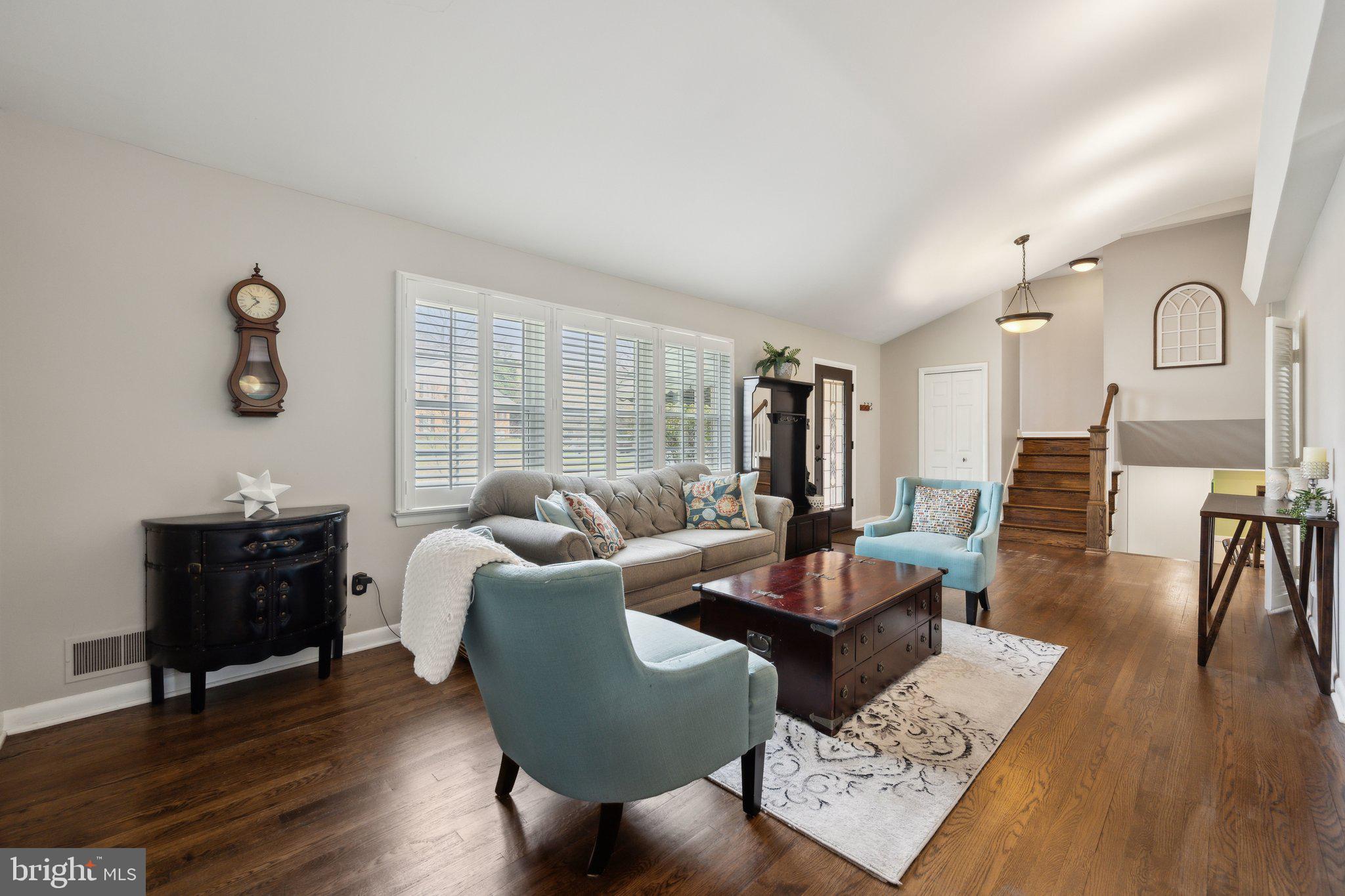 10601 Meadowhill Road Silver Spring, MD 20901 - Photo 4 of 33 a living room with furniture and wooden floor