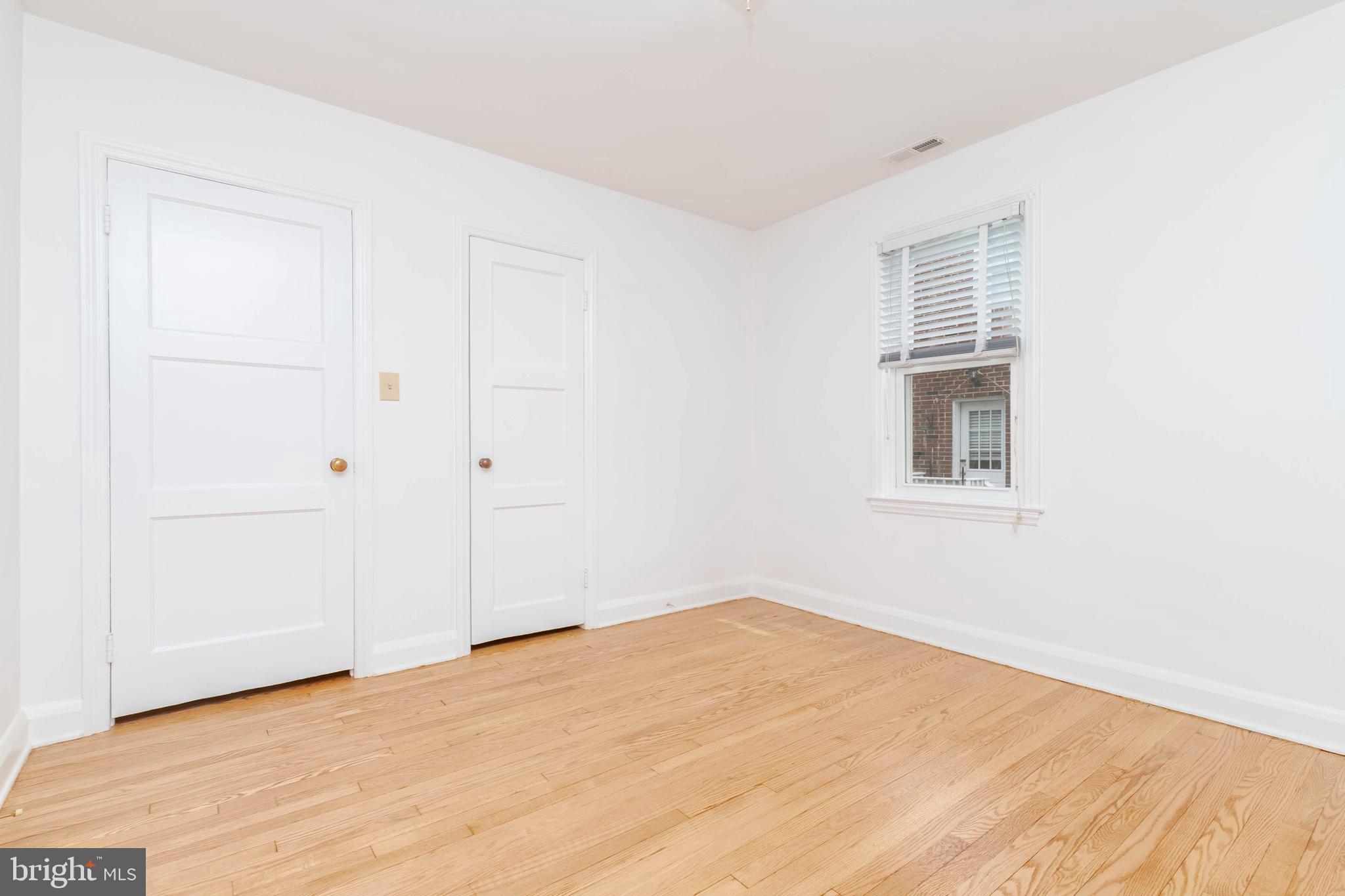 1102 Orems Road Baltimore, MD 21220 - Photo 13 of 46 a view of empty room with wooden floor