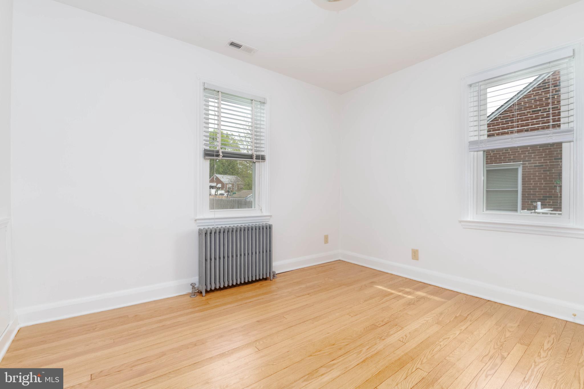 1102 Orems Road Baltimore, MD 21220 - Photo 17 of 46 an empty room with windows