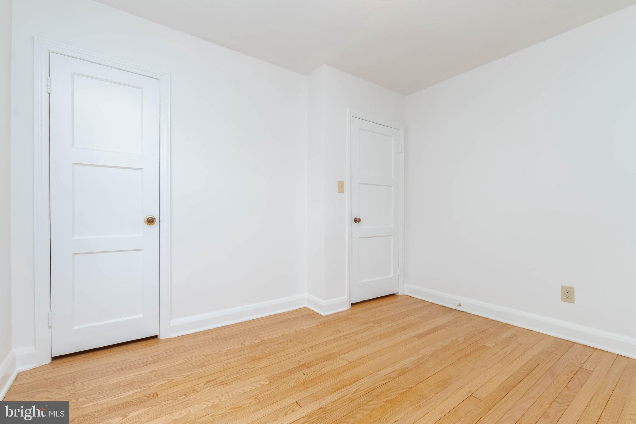 1102 Orems Road Baltimore, MD 21220 - Photo 19 of 46 a view of empty room with wooden floor