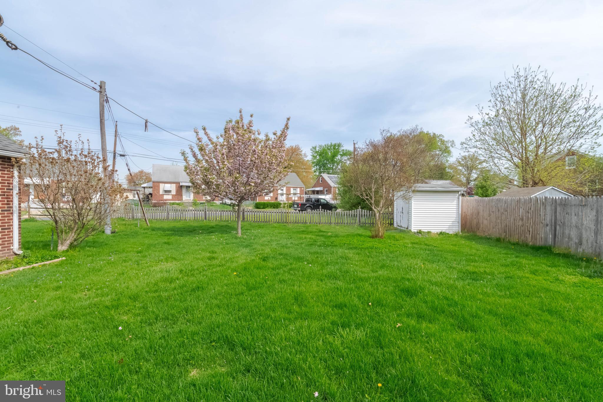 1102 Orems Road Baltimore, MD 21220 - Photo 40 of 46 a view of a garden with a building in the background
