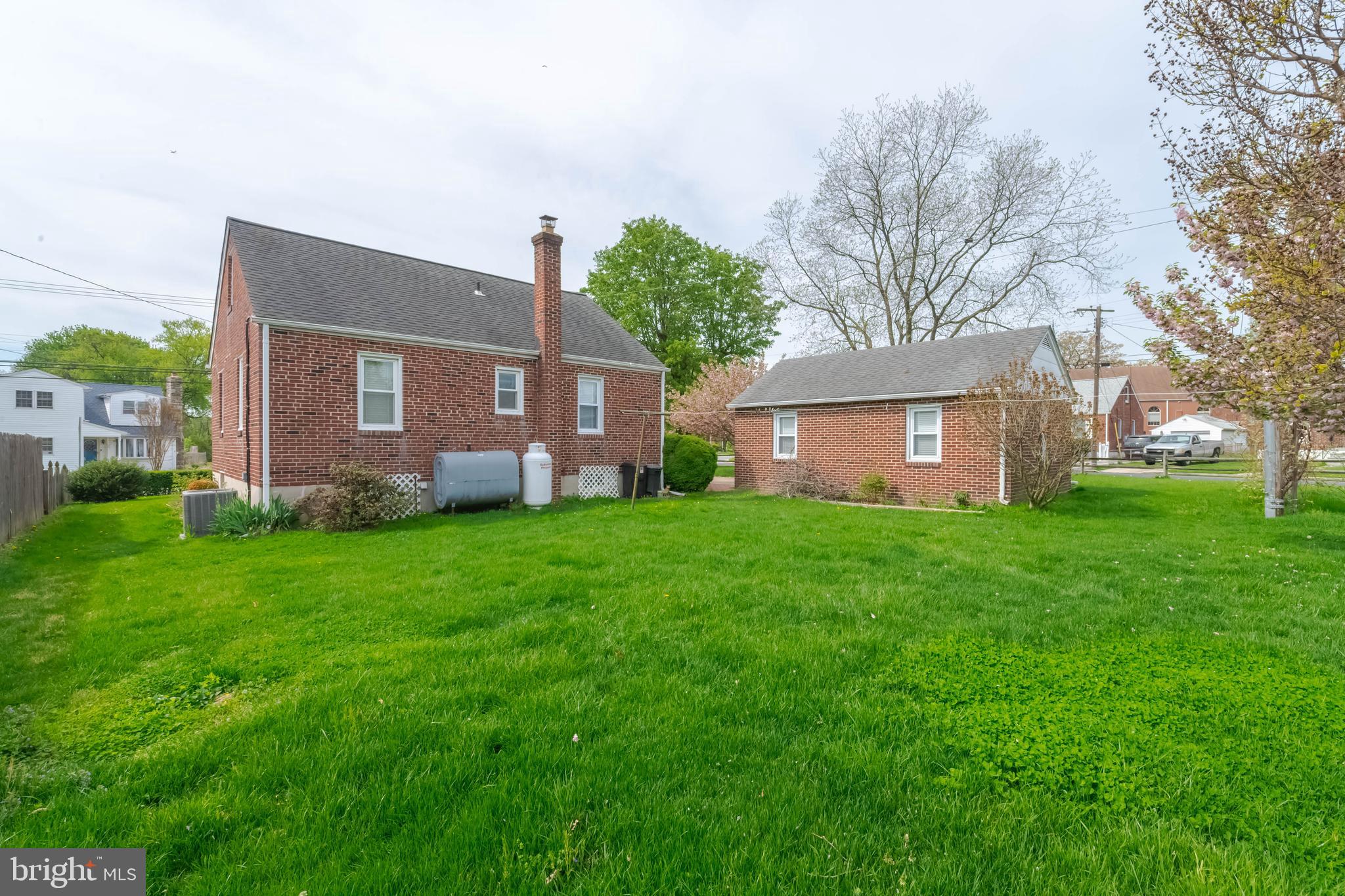 1102 Orems Road Baltimore, MD 21220 - Photo 41 of 46 a front view of house with yard and green space