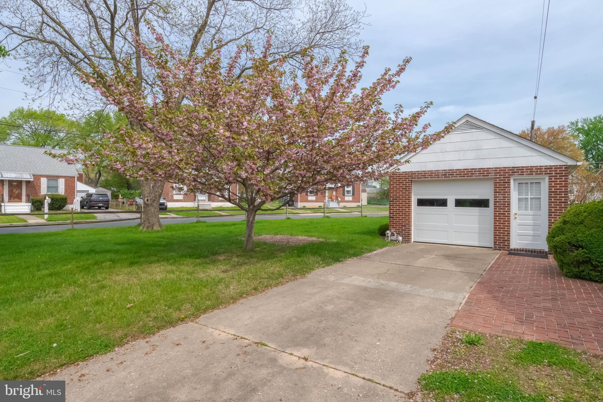 1102 Orems Road Baltimore, MD 21220 - Photo 45 of 46 a front view of a house with garden