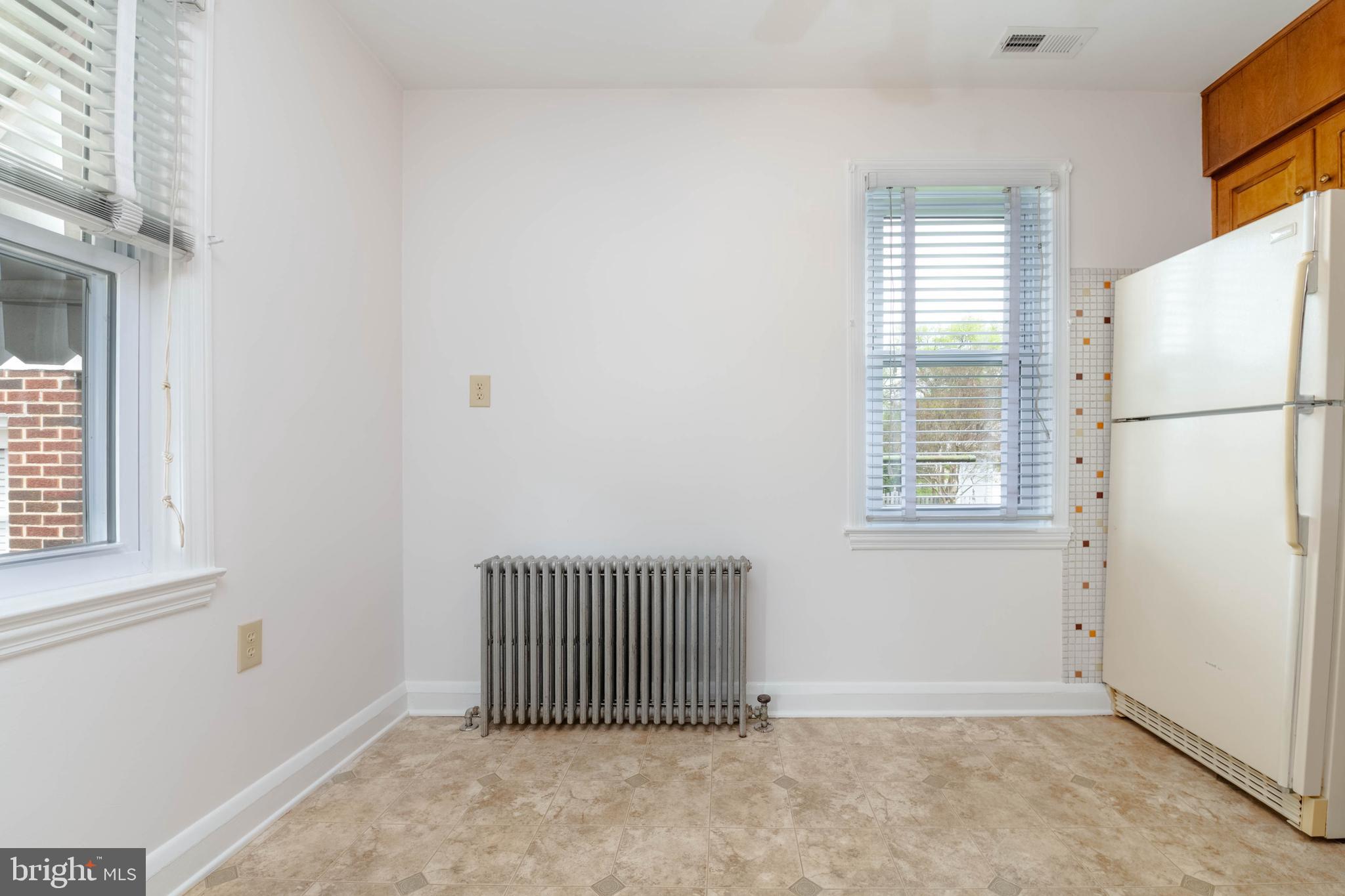 1102 Orems Road Baltimore, MD 21220 - Photo 9 of 46 an empty room with windows