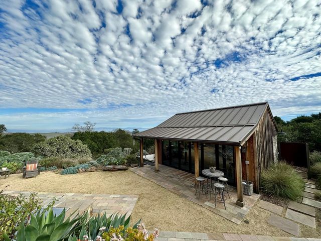 an outdoor space with seating area