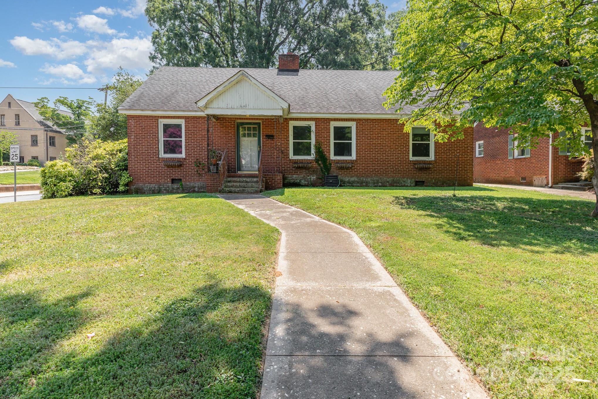 1701 Dilworth Road East Charlotte, NC 28203 - Photo 1 of 1 a view of a yard in front of a house
