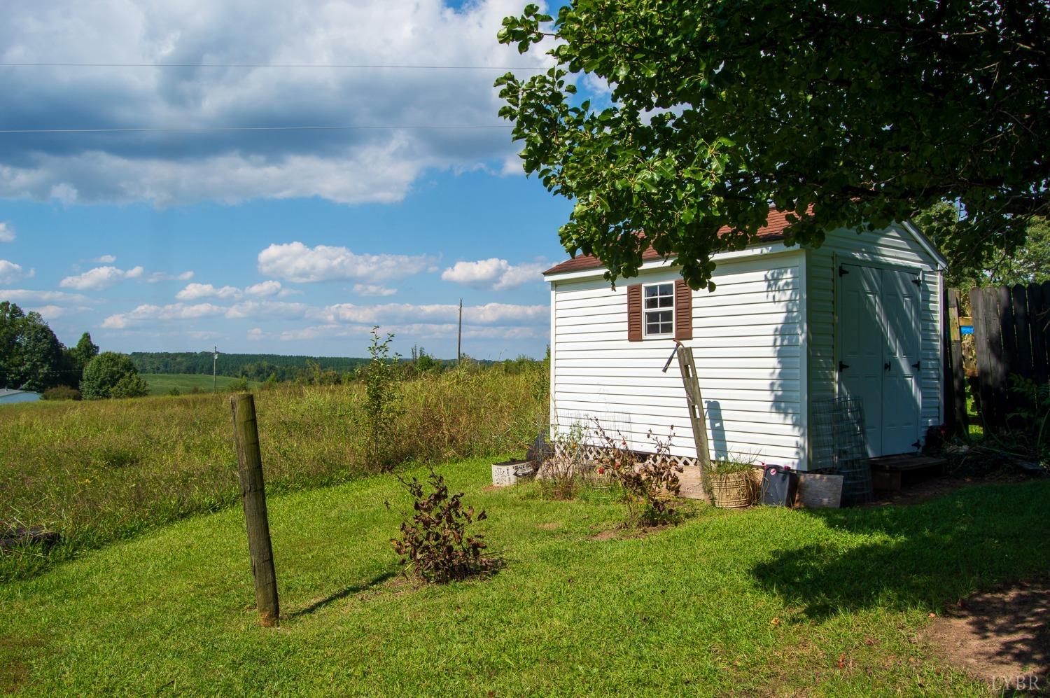 4740 Payneton Road Chatham, VA 24531 - Photo 11 of 49 a view of a backyard with large garden