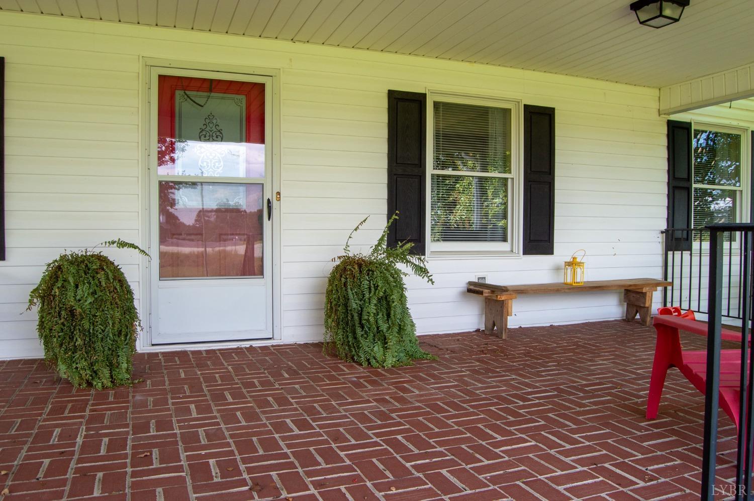 4740 Payneton Road Chatham, VA 24531 - Photo 12 of 49 a floor to ceiling window and potted plant