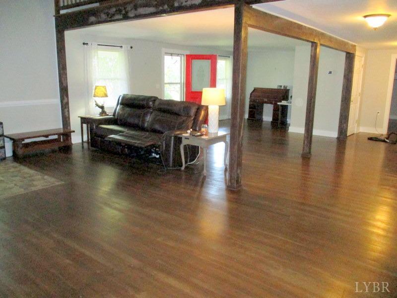 4740 Payneton Road Chatham, VA 24531 - Photo 16 of 49 a living room with furniture and a wooden floor