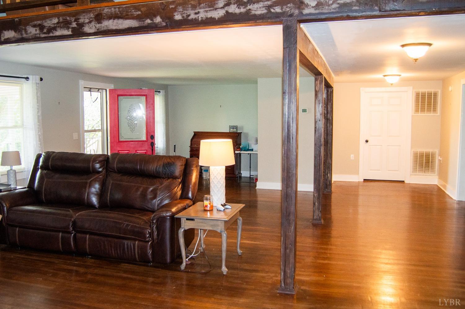4740 Payneton Road Chatham, VA 24531 - Photo 17 of 49 a living room with furniture and a wooden floor