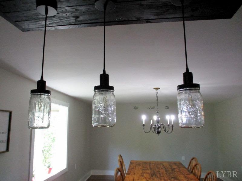 4740 Payneton Road Chatham, VA 24531 - Photo 26 of 49 a view of a chandelier and kitchen view