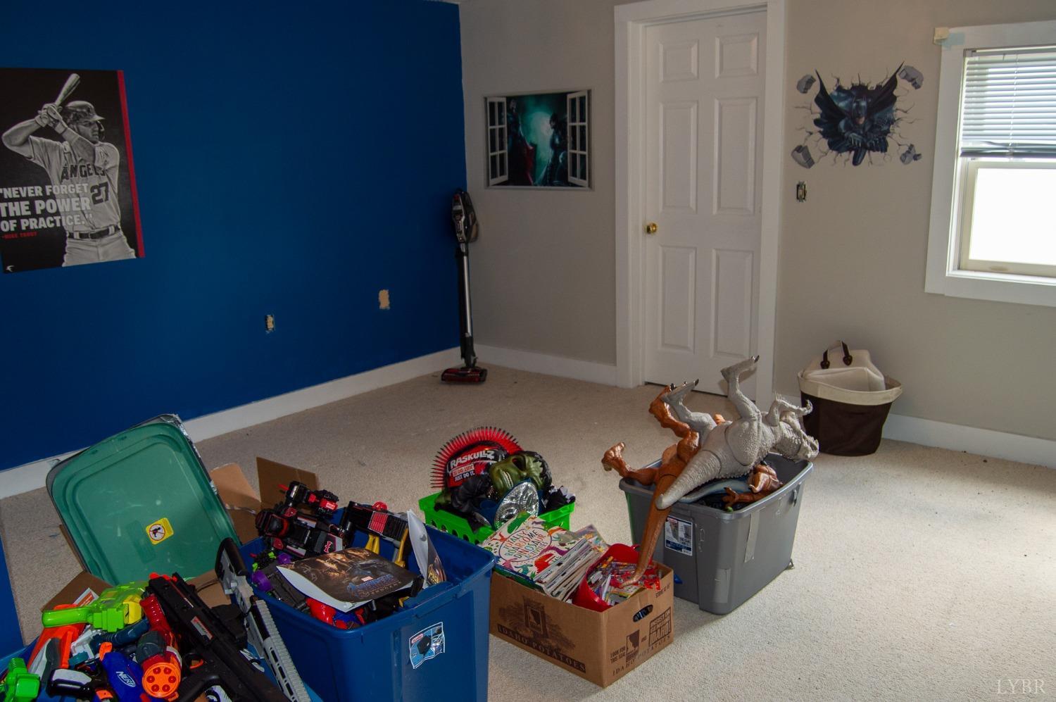 4740 Payneton Road Chatham, VA 24531 - Photo 40 of 49 a bed room with furniture and a couch
