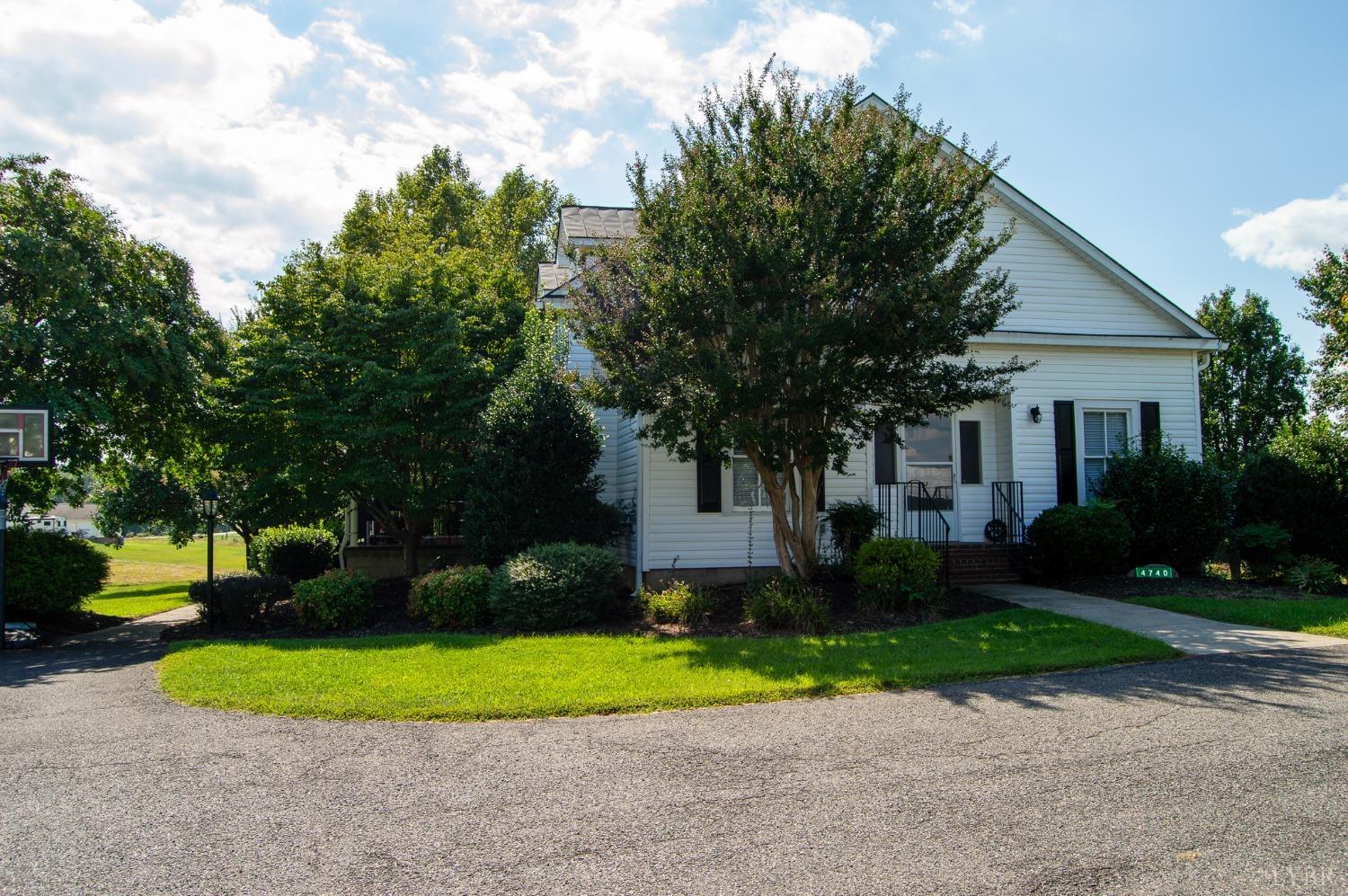 4740 Payneton Road Chatham, VA 24531 - Photo 4 of 49 a front view of a house with a yard and a garage