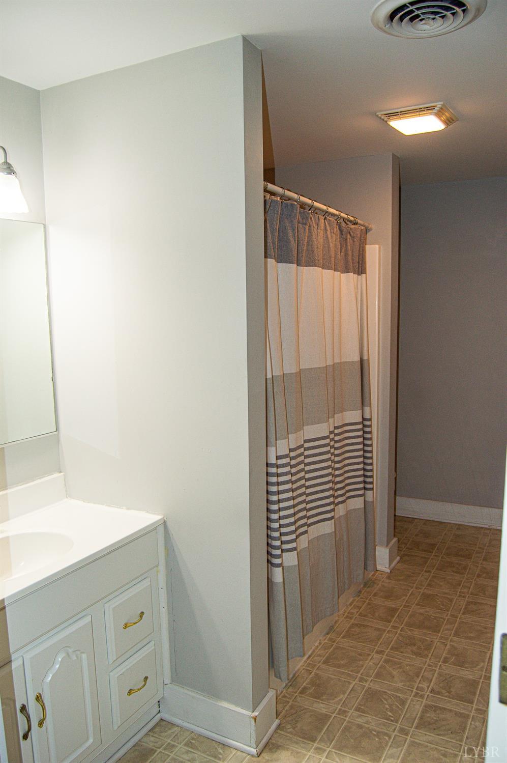 4740 Payneton Road Chatham, VA 24531 - Photo 41 of 49 a bathroom with a shower and a sink