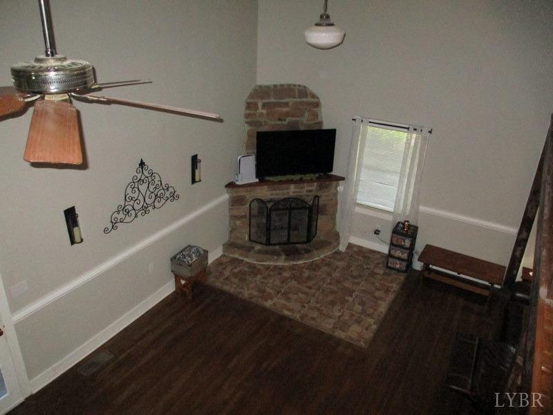 4740 Payneton Road Chatham, VA 24531 - Photo 43 of 49 a living room with furniture and a flat screen tv