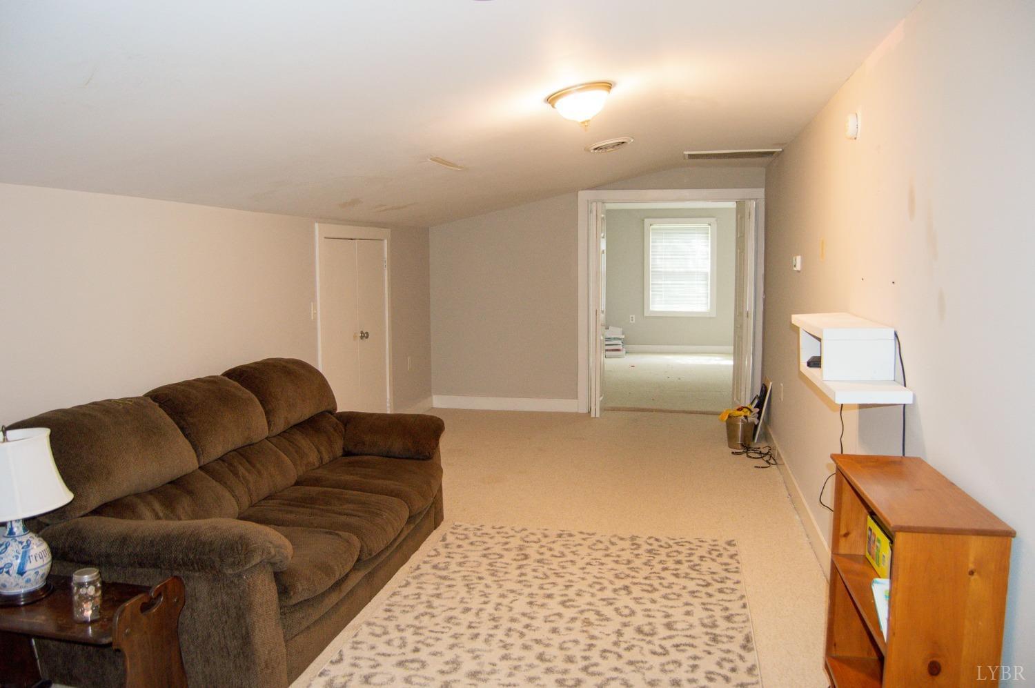 4740 Payneton Road Chatham, VA 24531 - Photo 44 of 49 a living room with furniture and a couch