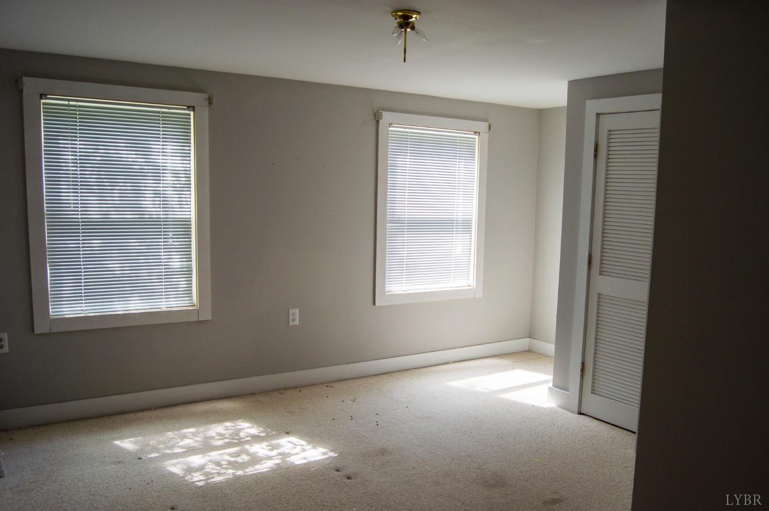 4740 Payneton Road Chatham, VA 24531 - Photo 46 of 49 an empty room with windows