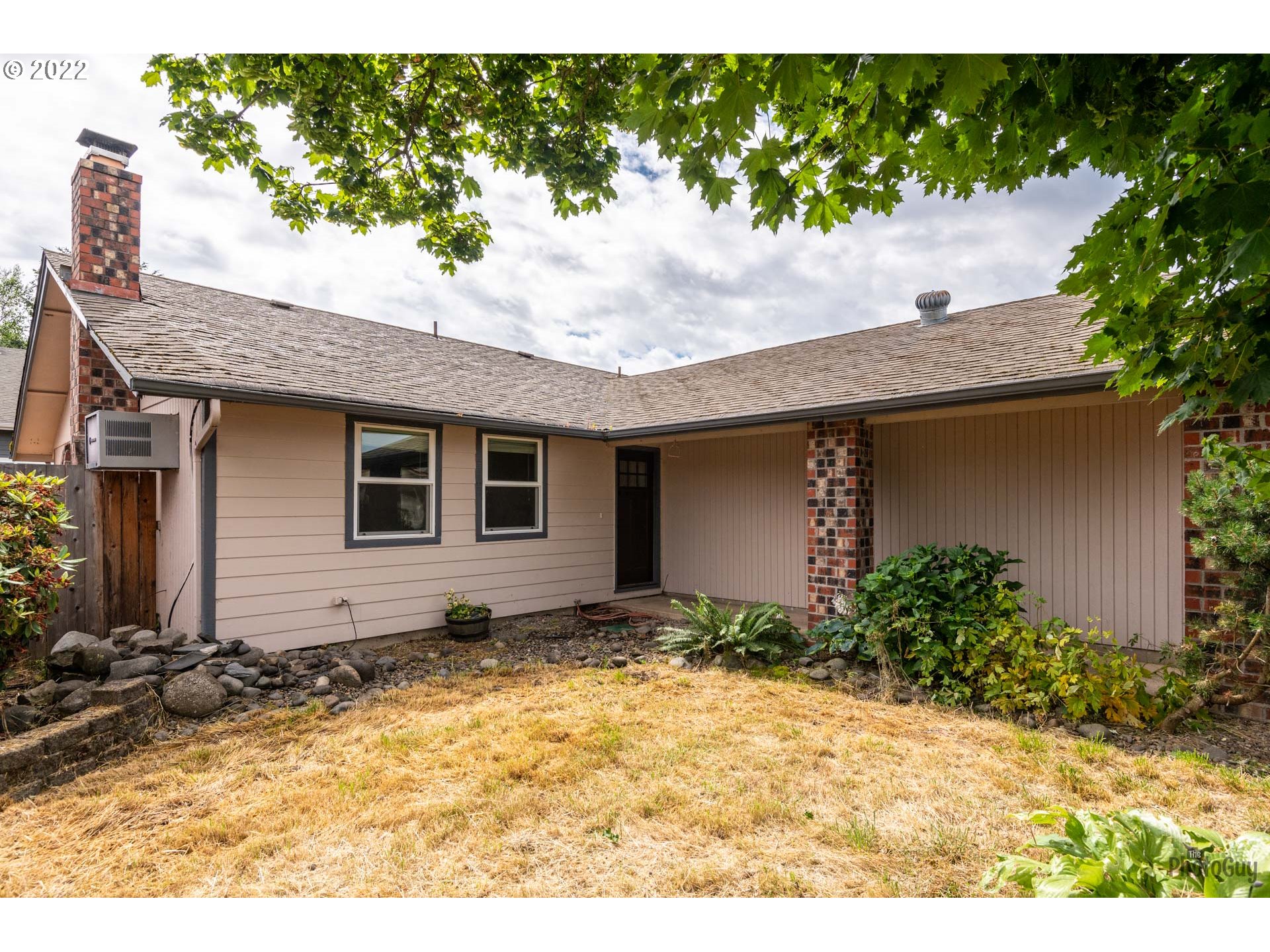 a house view with a outdoor space