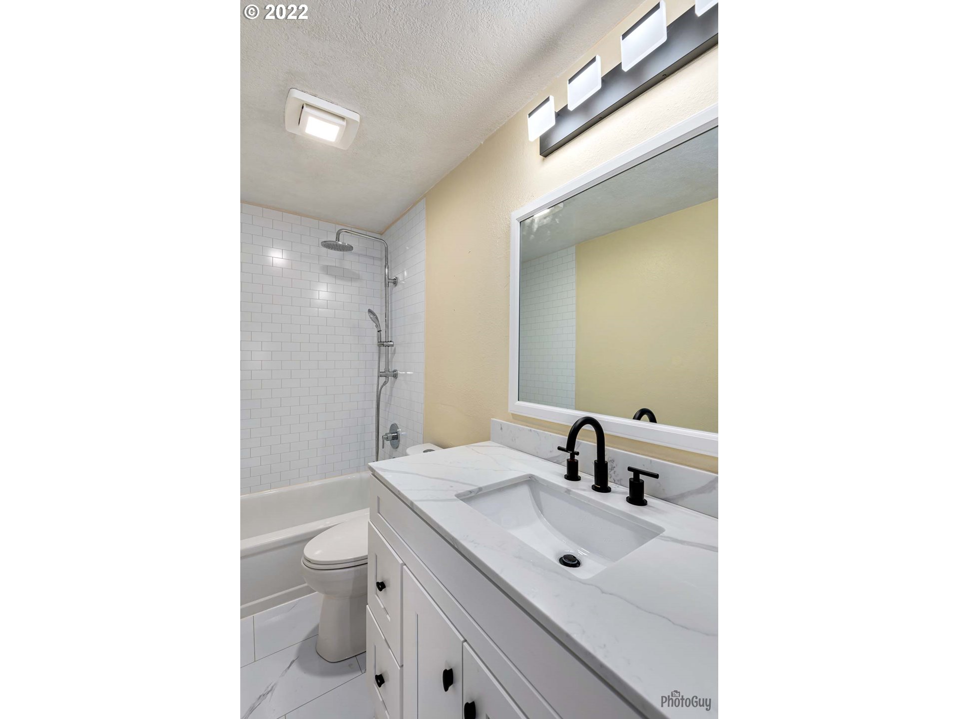 529 Sandstone Way Eugene, OR 97402 - Photo 11 of 19 a bathroom with a sink a toilet and shower