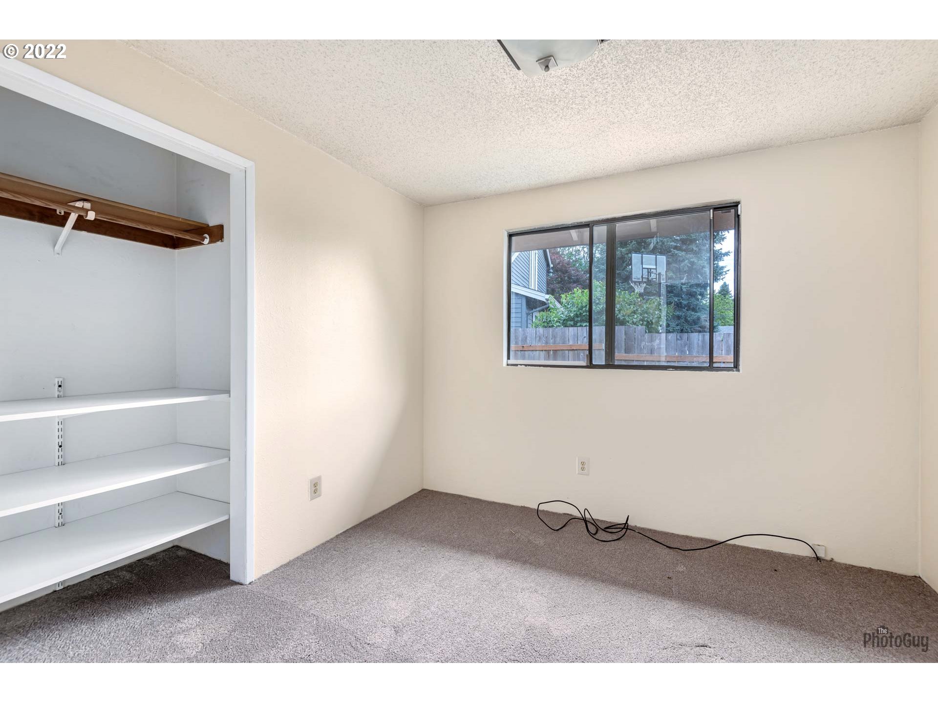 529 Sandstone Way Eugene, OR 97402 - Photo 17 of 19 a view of an empty room with a window