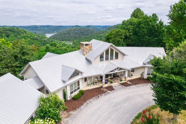 an aerial view of a house with a garden