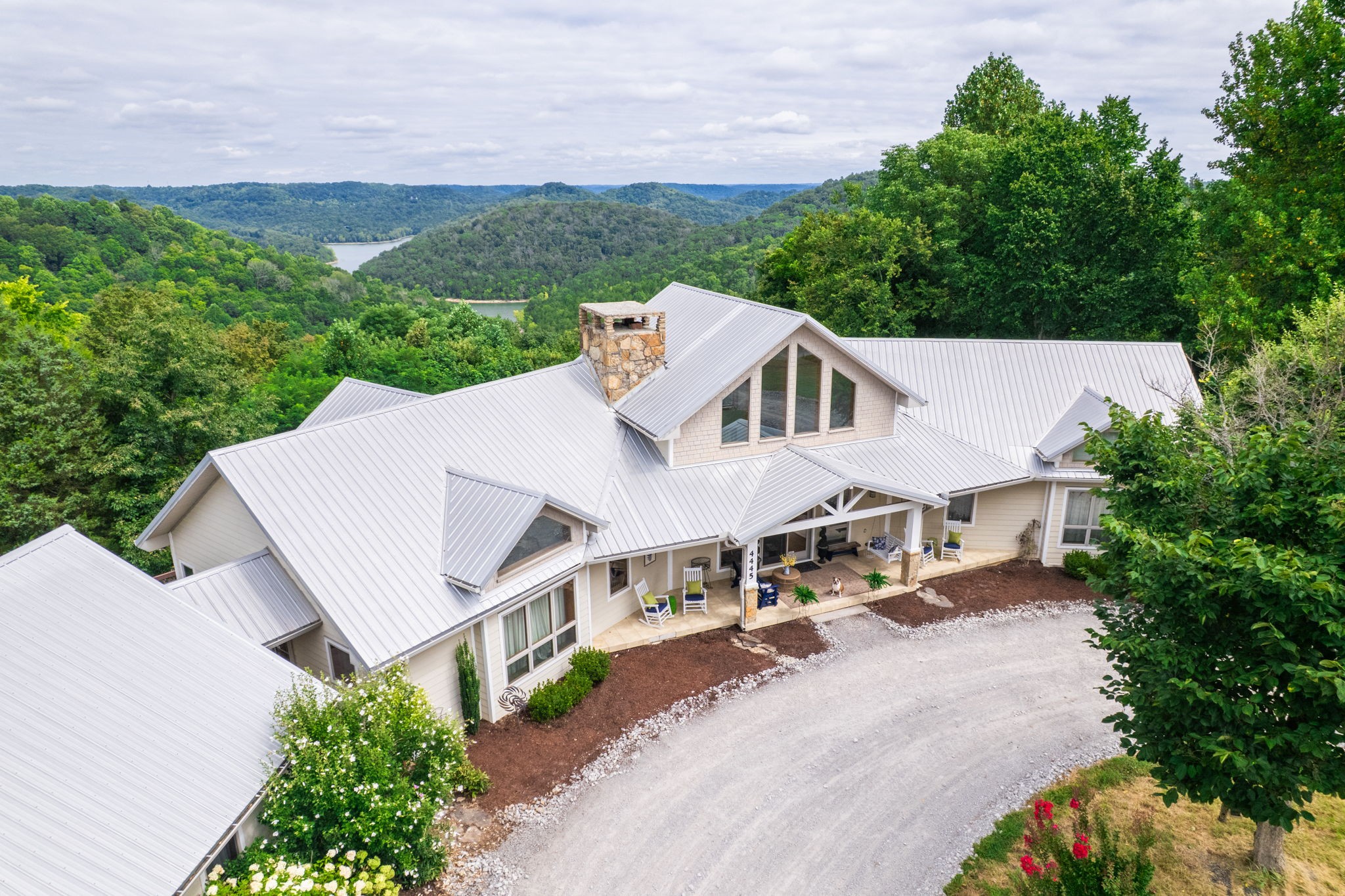 an aerial view of a house with a garden