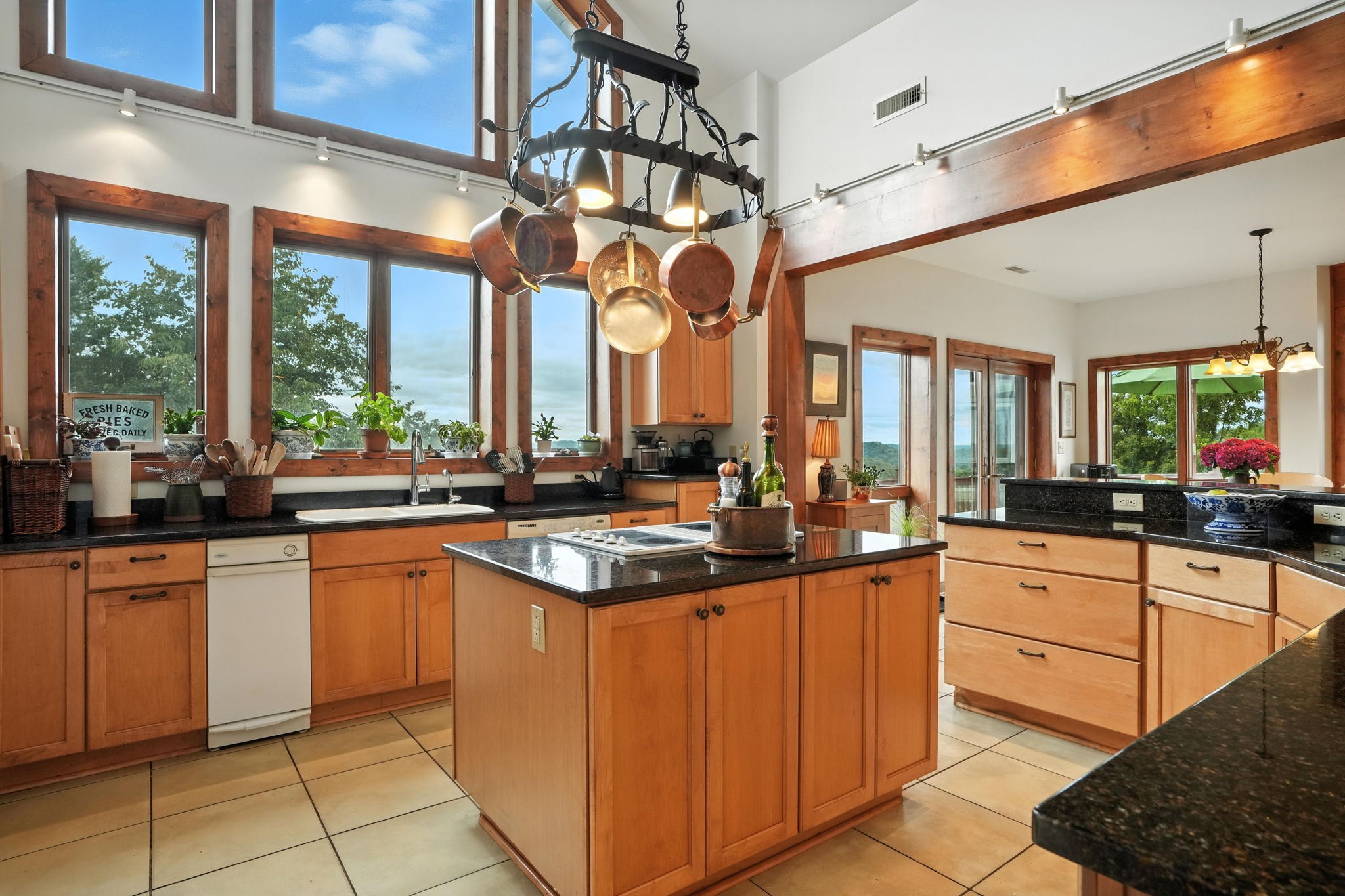 4445 Hurricane Ridge Road Smithville, TN 37166 - Photo 22 of 84 a kitchen with stainless steel appliances granite countertop a sink and cabinets