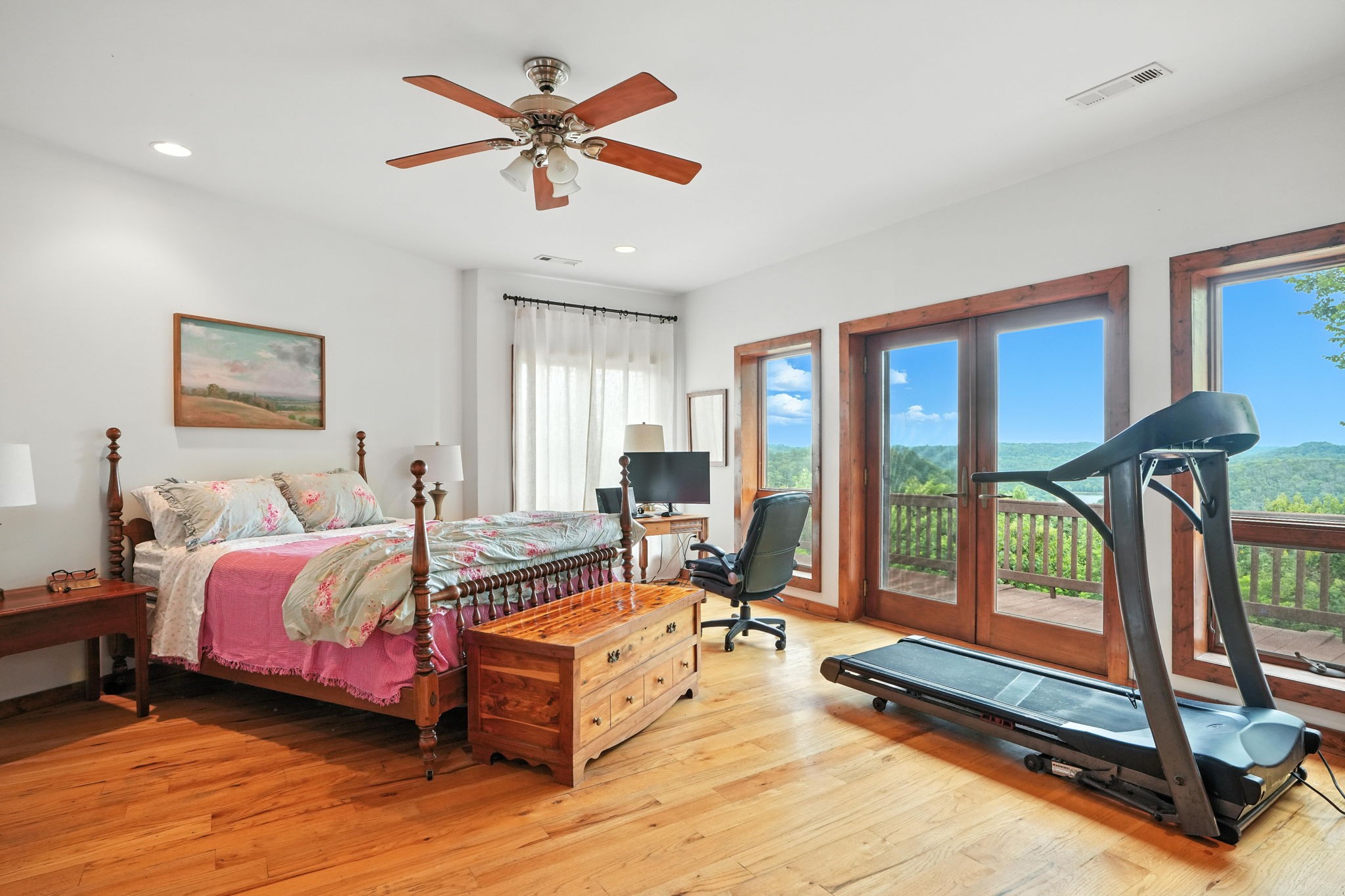 4445 Hurricane Ridge Road Smithville, TN 37166 - Photo 28 of 84 a spacious bedroom with a bed and a large window