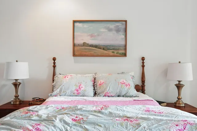 a view of a backyard with sitting area